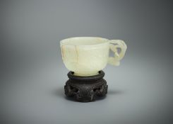 A Chinese pale celadon jade 'Dragon' cup