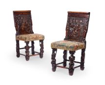 A PAIR OF FLEMISH WALNUT BACKSTOOLS 19TH CENTURY