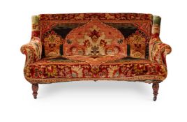 A MID-VICTORIAN WALNUT SOFA CIRCA 1880