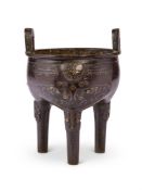 A CHINESE BRONZE SILVER-INLAID AND GILT 'ARCHAISTIC' DING TRIPOD CENSER, 17TH OR 18TH CENTURY