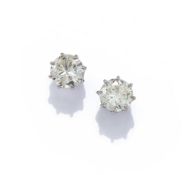 A PAIR OF DIAMOND SINGLE STONE EARRINGS
