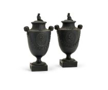 ‡ A PAIR OF WEDGWOOD & BENTLEY BLACK BASALT VASES AND COVERS, LATE 18TH CENTURY