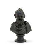 ‡ A WEDGWOOD & BENTLEY BLACK BASALT BUST OF DEMOCRATES, CIRCA 1775