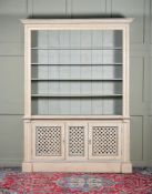 A CREAM PAINTED CABINET BOOKCASE IN 19TH CENTURY STYLE