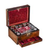 Y A VICTORIAN WALNUT AND SILVER COLOURED METAL TRAVELLING GROOMING SET
