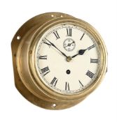 A VICTORIAN BRASS SHIP’S BULKHEAD TIMEPIECE