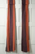 A PAIR OF STRIPED FABRIC CURTAINS