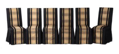 A SET OF TWELVE SILK UPHOLSTERED HIGH BACK DINING CHAIRS