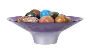 A COLLECTION OF APPROXIMATELY TWENTY SEVEN CARVED STONE MODELS OF EGGS