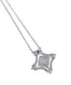 A DIAMOND METAMORPHIC PENDANT/NECKLACE