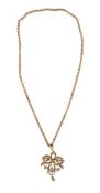 AN EDWARDIAN PERIDOT AND SEED PEARL PENDANT NECKLACE
