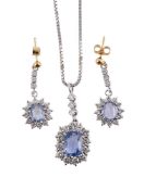 A SAPPHIRE AND DIAMOND CLUSTER PENDANT AND EARRINGS