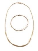 A 9 CARAT GOLD NECKLACE AND BRACELET, LONDON 1976 IMPORT MARK