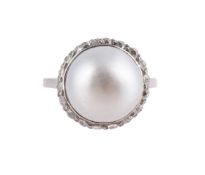 A MID 20TH CENTURY DIAMOND AND CULTURED PEARL CLUSTER RING