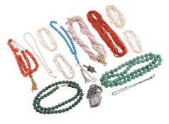 Y A COLLECTION OF BEADED NECKLACES