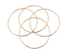 FOUR PATTERNED BANGLES