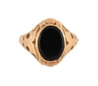 A 19TH CENTURY ONYX SIGNET RING