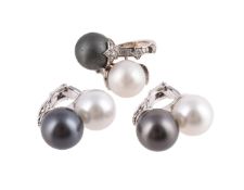 A SOUTH SEA CULTURED AND TAHITIAN CULTURED PEARL AND DIAMOND CROSSOVER RING AND A PAIR OF EAR CLIPS