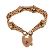 CHARLES DANIEL BROUGHTON, A LATE VICTORIAN PERIDOT BRACELET
