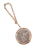 A FRENCH GOLD COLOURED AND ANTIQUE COIN FOB KEY CHAIN