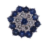 A SAPPHIRE AND DIAMOND TARGET CLUSTER RING, LONDON 1974