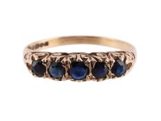 A SAPPHIRE FIVE STONE RING