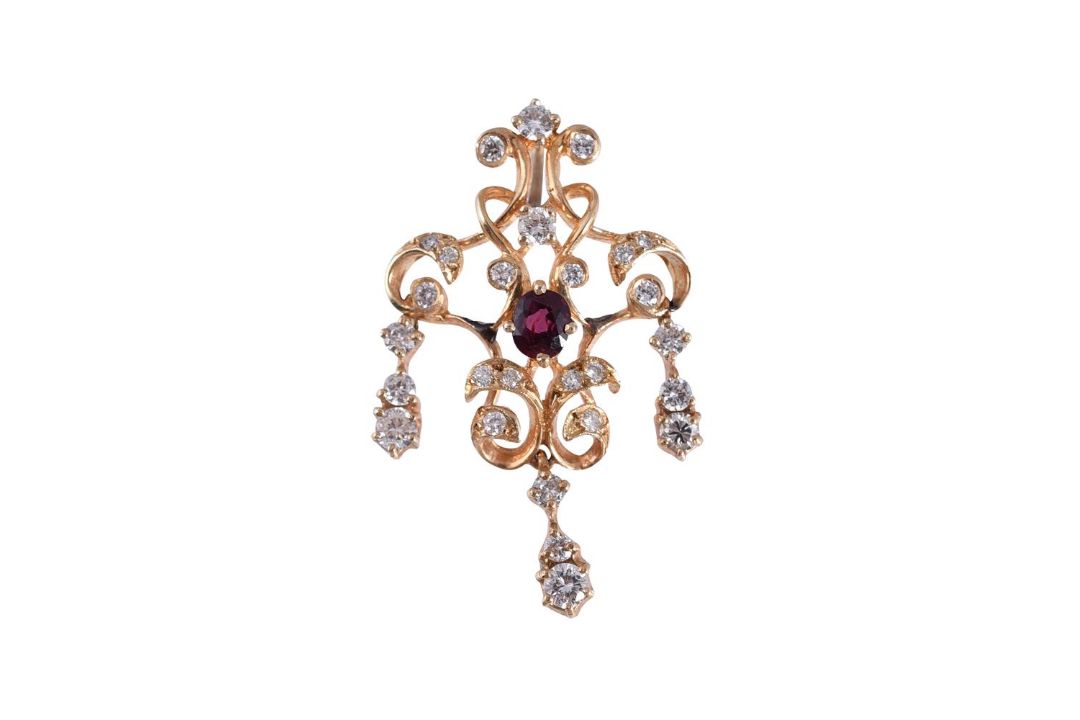 A GARNET AND DIAMOND PENDANT