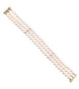 A FRENCH THREE STRAND CULTURED PEARL BRACELET WITH A DIAMOND CLASP
