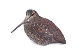 λ KAREN FAWCETT, A COLD PAINTED RED CERAMIC MODEL OF A SNIPE, EARLY 21ST CENTURY