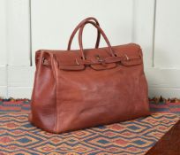 A MULBERRY CHESTNUT SADDLE GIRTHGRAIN LEATHER HOLDALL, THE ORIGINAL 'IT' BAG INSPIRATION