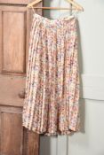 A MULBERRY PLEATED SILK FLORAL SKIRT