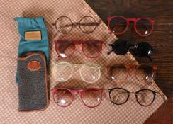 EIGHT PAIRS OF COLOURED FRAMED GLASSES AND SUNGLASSES