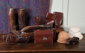A COLLECTION OF VARIOUS LEATHER ITEMS WHICH WERE USED AS PROPS IN MULBERRY SHOPS