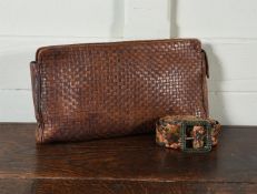 A MULBERRY BASKET WEAVE LEATHER ZIP CLUTCH BAG WITH A LEATHER BELT