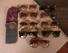 NINE PAIRS OF TORTOISESHELL GLASSES AND TWO POUCHES