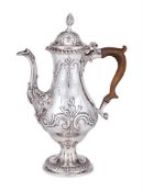 A GEORGE II SILVER BALUSTER COFFEE POT