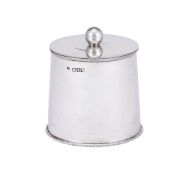 AN EDWARDIAN SILVER CIRCULAR SLIGHTLY TAPERING TEA CADDY