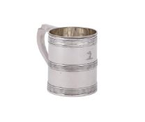 A GEORGE III SILVER TANKARD