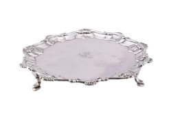 A GEORGE III SILVER SHAPED CIRCULAR WAITER