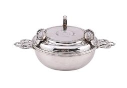 A SILVER TWIN HANDLED ECUELLE AND COVER