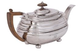 A GEORGE III SILVER OBLONG BALUSTER TEAPOT