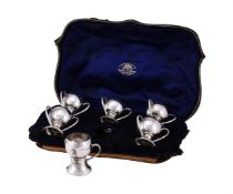 A CASED SET OF SIX EDWARDIAN SILVER SALTS