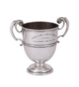 A SILVER TWIN HANDLED TROPHY CUP