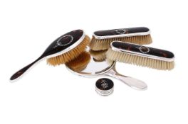 Y A SILVER MOUNTED AND TORTOISESHELL FOUR PIECE DRESSING TABLE SET
