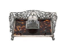 Y A LATE VICTORIAN SILVER MOUNTED AND TORTOISESHELL INK WELL