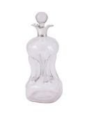 AN EDWARDIAN SILVER MOUNTED GLASS DECANTER
