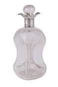 A VICTORIAN SILVER MOUNTED GLASS DECANTER