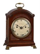 A GEORGE III SMALL BRASS MOUNTED MAHOGANY BRACKET CLOCK
