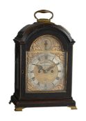 A GEORGE III BRASS MOUNTED EBONISED TRIPLE-PAD TOP TABLE/BRACKET CLOCK