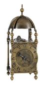 AN INTERESTING EARLY ENGLISH BRASS LANTERN CLOCK